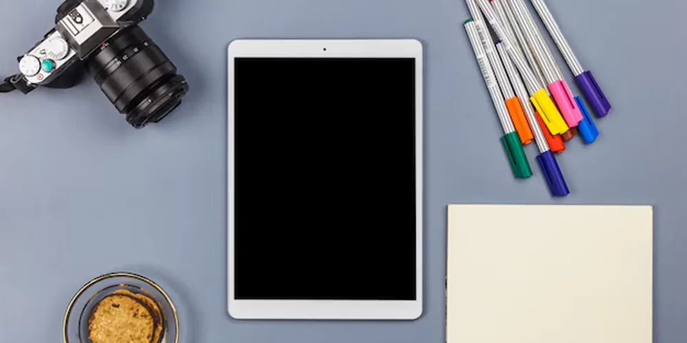 tablet-near-camera-paper-biscuits-bowl